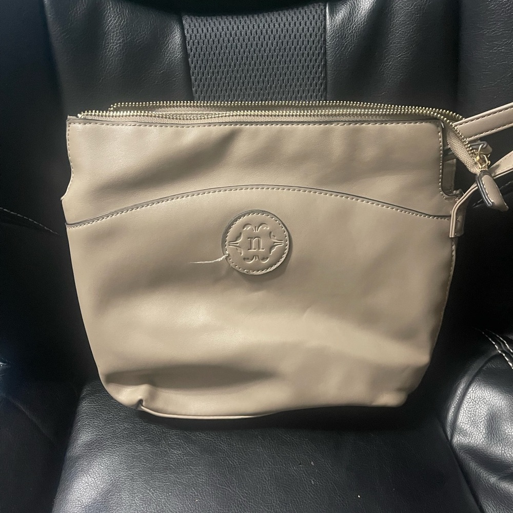 Sand colored cross body bag